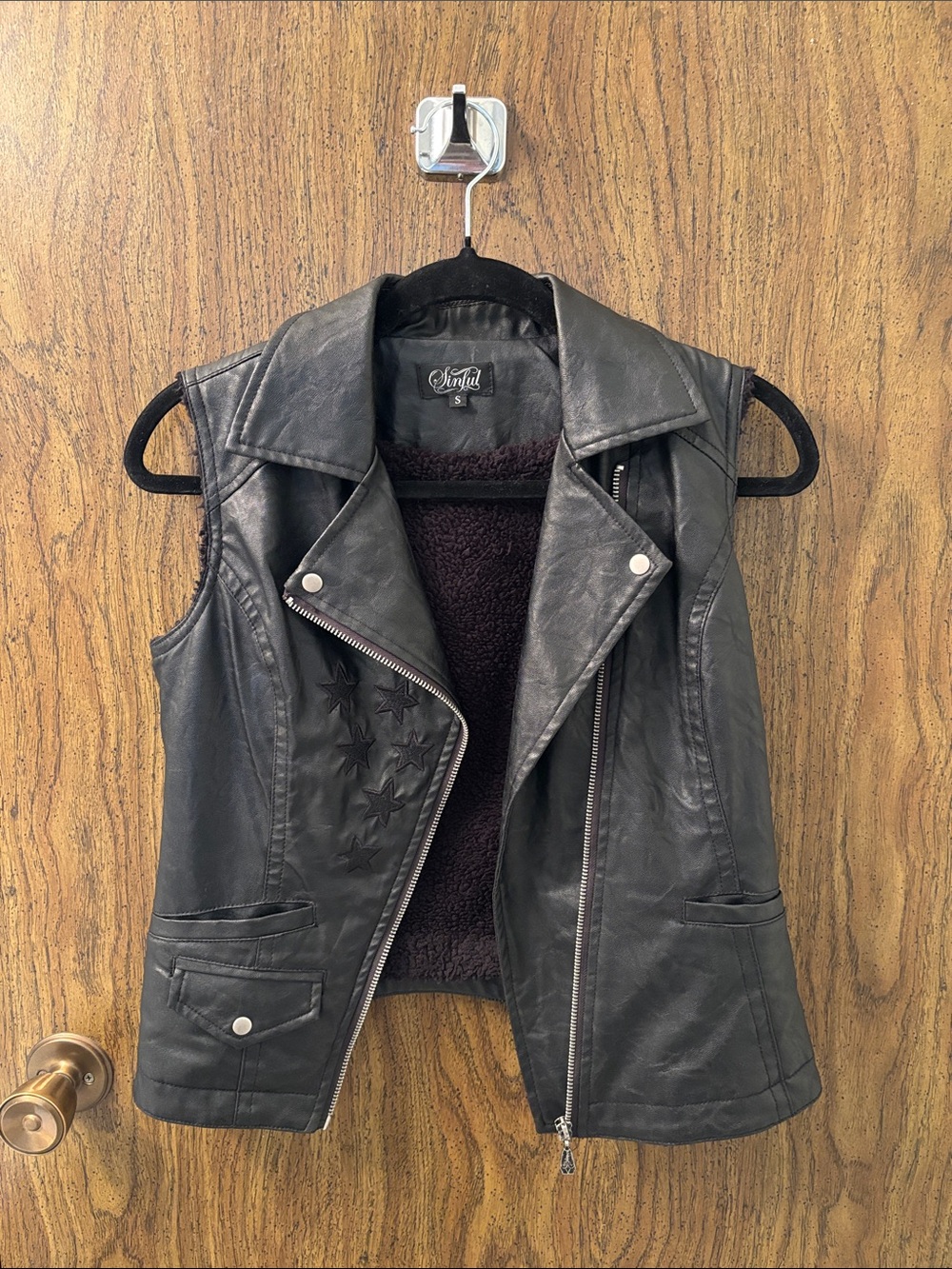 Sinful Black Faux Leather Star-Embossed Sleeveless Vest with Shearling Lining
